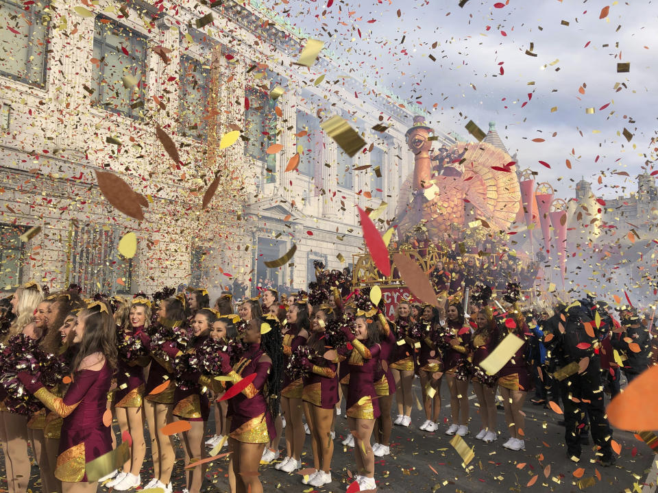 Confetti flies at the start of the Macy's Thanksgiving Day Parade, Thursday, Nov. 28, 2019, in New York. (AP Photo/Mark Lennihan)