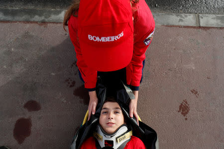 Members of firefighter school perform first aid exercises during a training session in Oliveira do Hospital, Portugal November 10, 2018. Picture taken November 10, 2018. REUTERS/Rafael Marchante