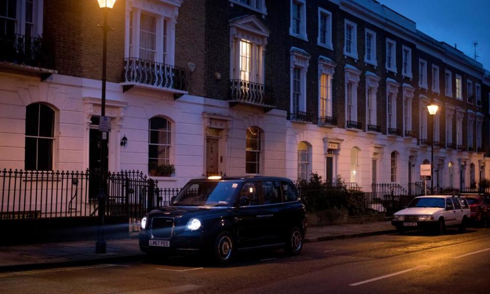 An electric black cab, on an Islington Street