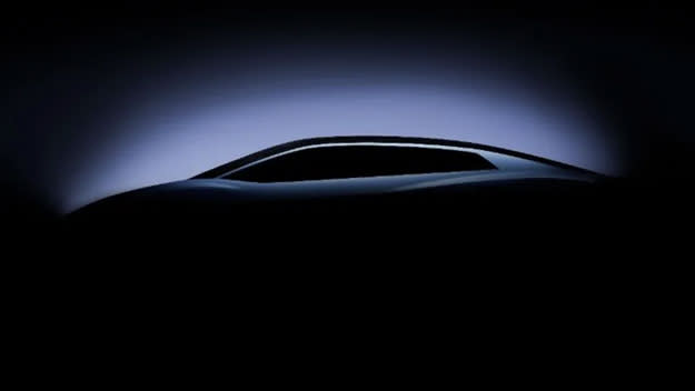 Image of the new Lamborghini EV shrouded in shadow, with only the roofline visible.
