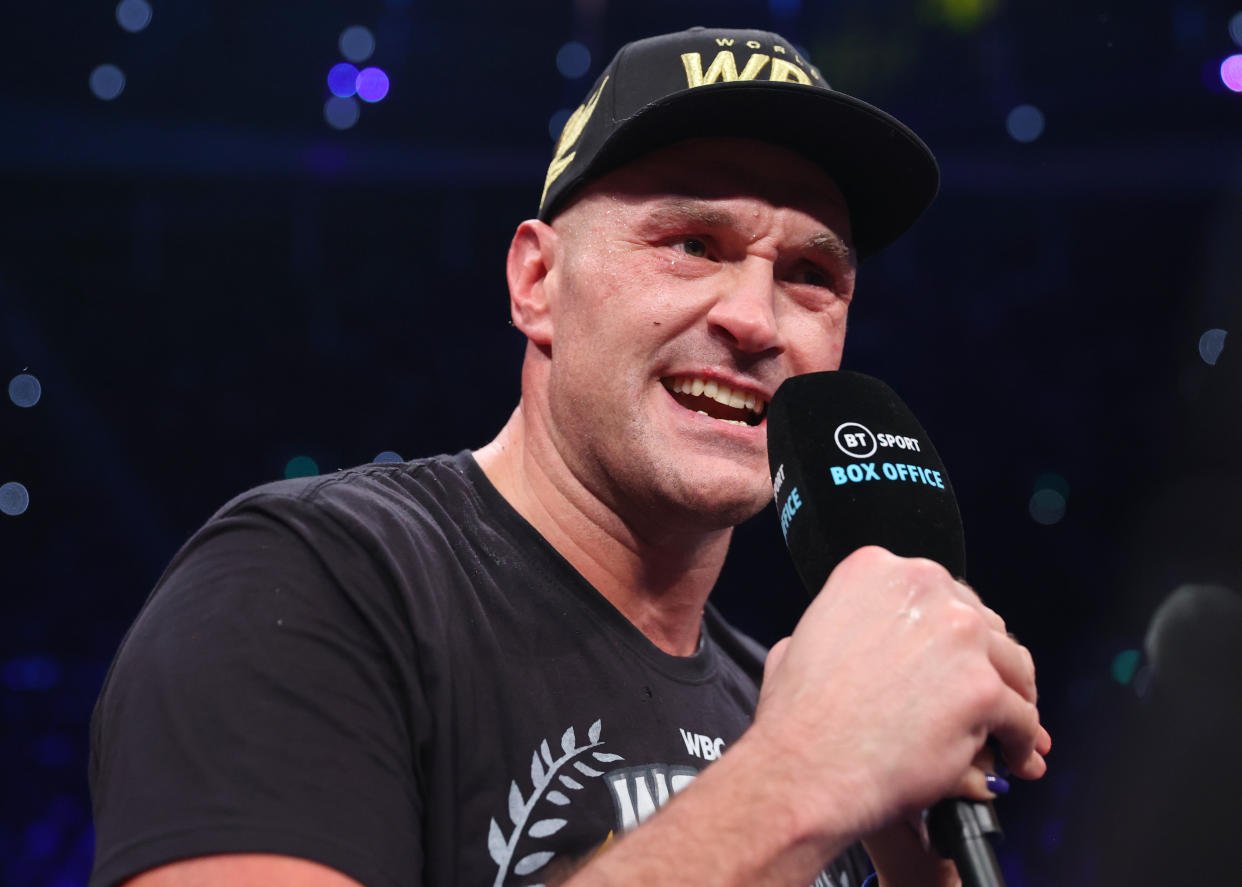 LONDON, ENGLAND - DECEMBER 03: Tyson Fury celebrates after defeating Derek Chisora, during their WBC heavyweight championship fight, at Tottenham Hotspur Stadium on December 03, 2022 in London, England. (Photo by Mikey Williams/Top Rank Inc via Getty Images)