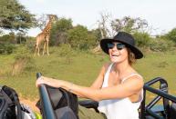 <p>Of course, it wouldn't be a South African adventure without a safari and it looks like Laura is loving life. Check out that giraffe!</p>