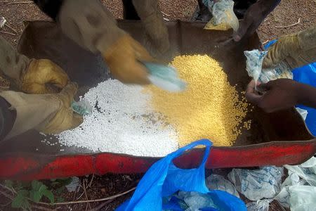 Senegalese police prepare to incinerate methamphetamines seized at the Malian border in Tambacounda, Senegal, June 29, 2014. REUTERS/Pape Demba Sidibe