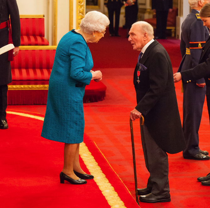 Johnny Johnson met the Queen at Buckingham Palace (Picture: PA)