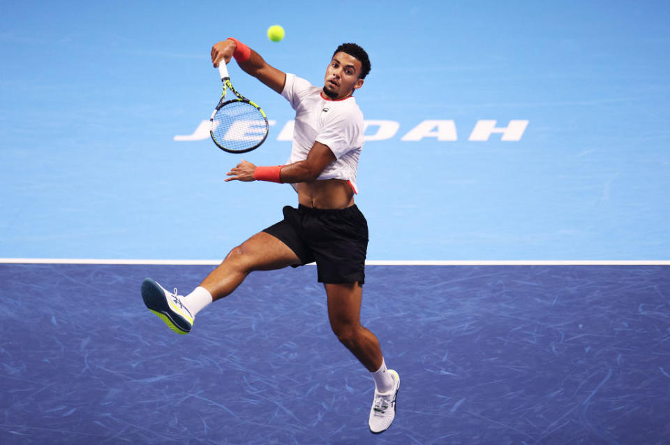 JEDDAH, SAUDI ARABIA - NOVEMBER 29: Arthur Fils of France hits a smash in his second round robin match against  Fabio Cobolli of Italy during day two of the Next Gen ATP Finals at King Abdullah Sports City on November 29, 2023 in Jeddah, Saudi Arabia. (Photo by Adam Pretty/Getty Images)