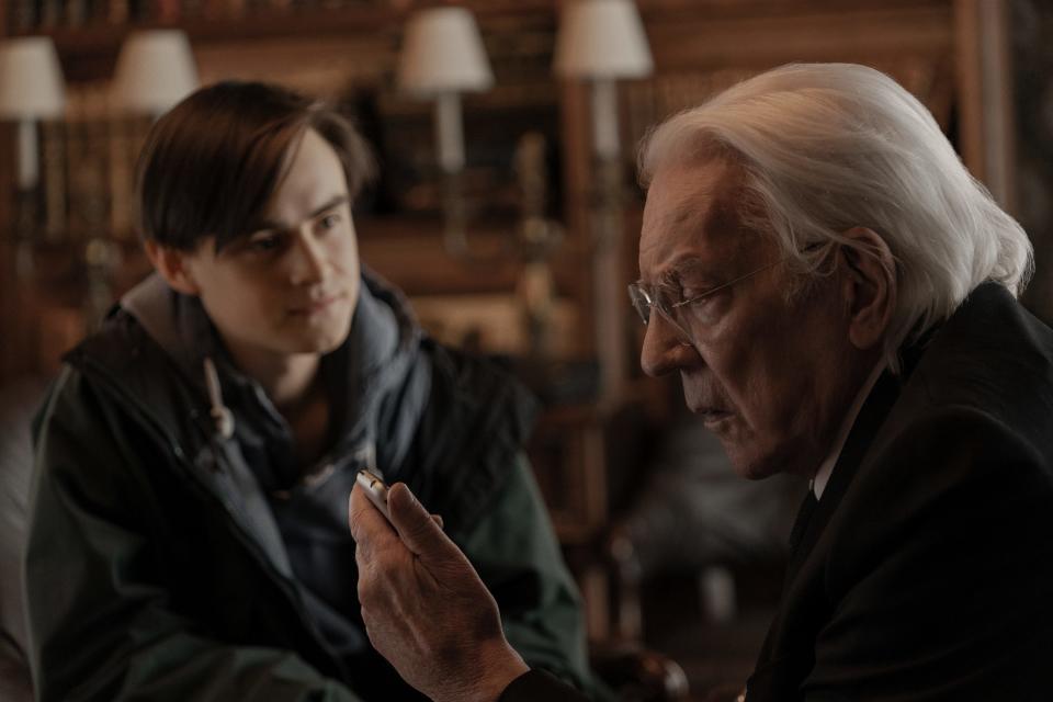 Jaeden Martell (left) stars as a boy who befriends a reclusive billionaire (Donald Sutherland) and is able to communicate with him via iPhone after the old man dies in "Mr. Harrigan’s Phone."