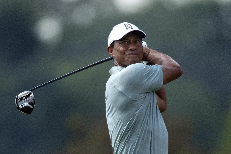 Tiger Woods plays his shot from the third tee during the first round of the BMW Championship golf tournament at Aronimink Golf Club, Thursday, Sept. 6, 2018, in Newtown Square, Pa. (Jose F. Moreno/The Philadelphia Inquirer via AP)