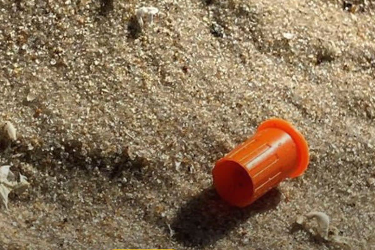 One Facebook user posted a photo of waste they had found on a Delaware beach. Beaches in Maryland, Virginia, and Delaware were closed to swimmers this week after large amounts of medical and other waste were found to have washed ashore on Sunday. The source of the waste remains under investigation.  (Delaware DNREC/Facebook)