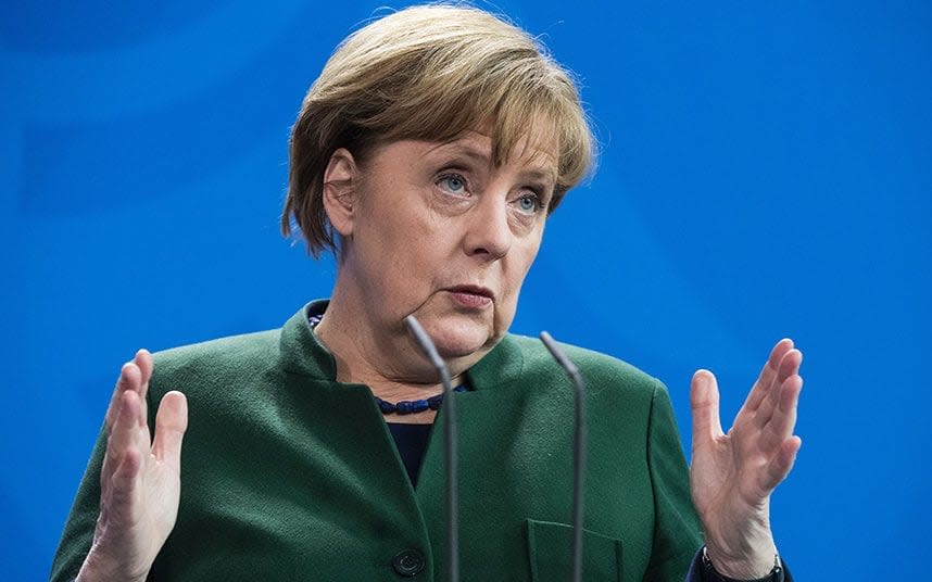 Angela Merkel is reportedly named in the letter - Credit: AFP