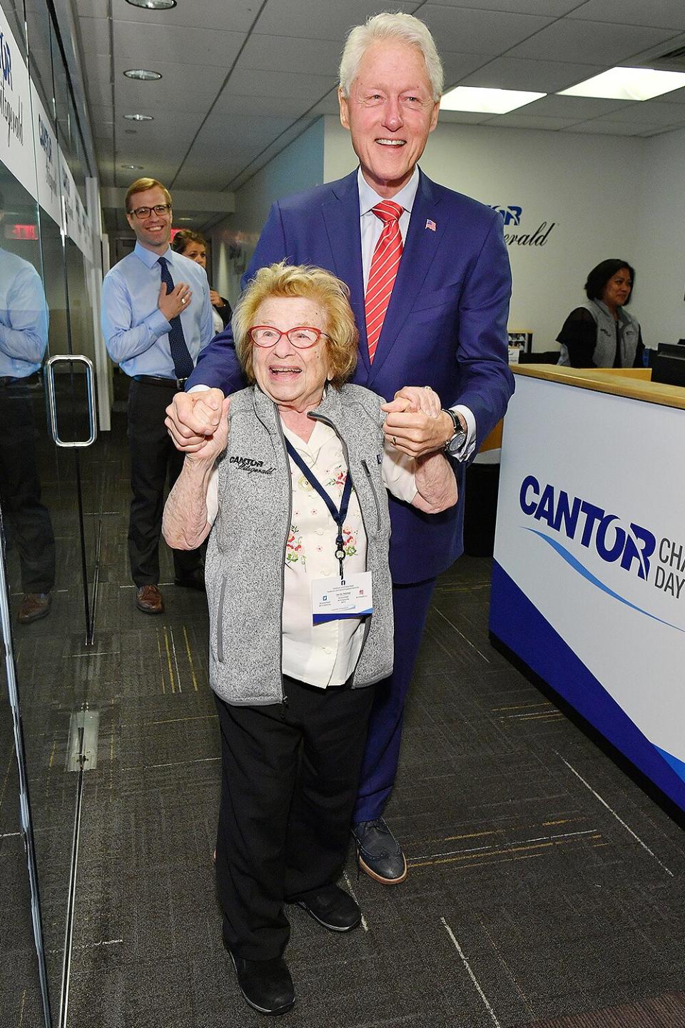 Dr. Ruth Westheimer (L) and Bill Clinton attend the Annual Charity Day hosted by Cantor Fitzgerald, BGC and GFI at Cantor Fitzgerald on September 11, 2018 in New York City.