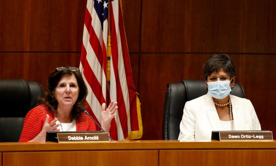 Supervisor Debbie Arnold comments while Dawn Ortiz-Legg listens during the San Luis Obispo County Board of Supervisors redistricting meeting on Nov. 30, 2021. The board voted 3-2 to throw out the current map in favor of a radically redrawn version created by Arroyo Grande resident Richard Patten.