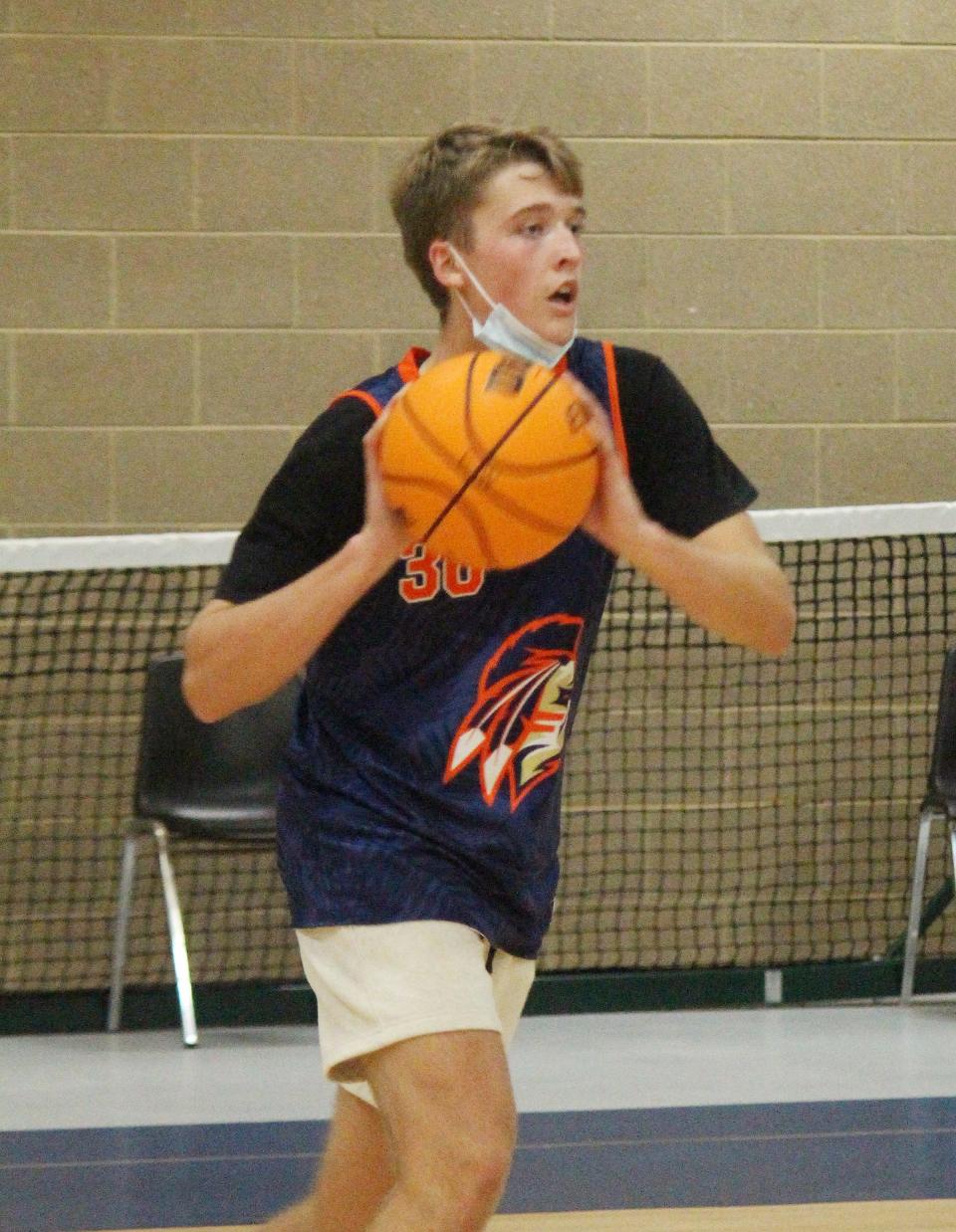 Pontiac sophomore Henry Brummel passes the ball during a drill at practice Tuesday at the Rec-Center.