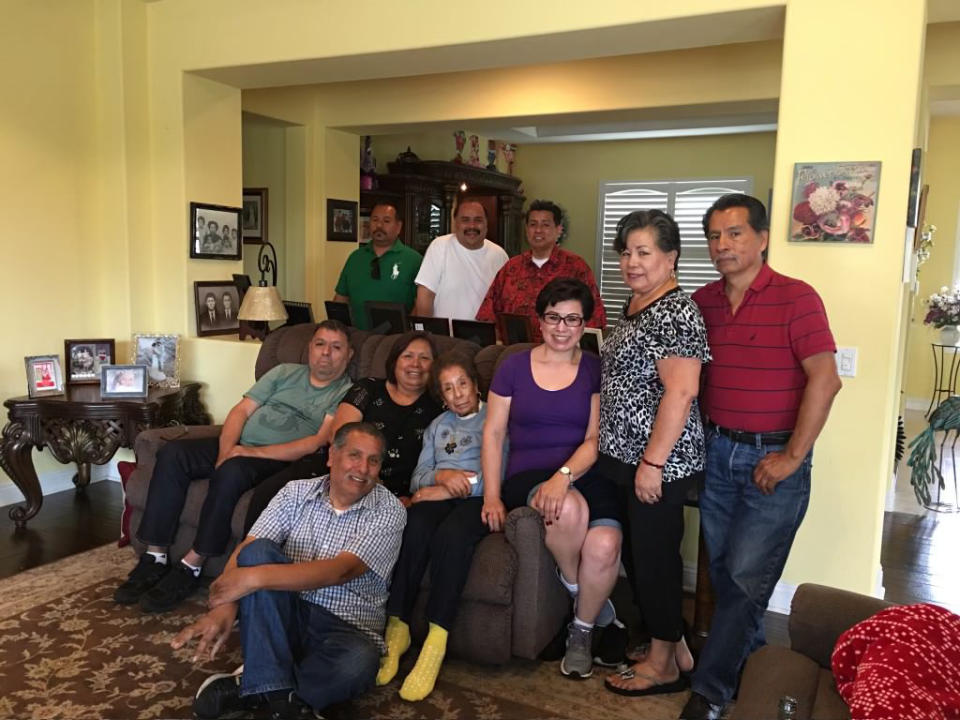 A family picture that includes the late Dolores Robledo, at center, flanked by family. (Courtesy Roberto’s Taco Shop; LLC)