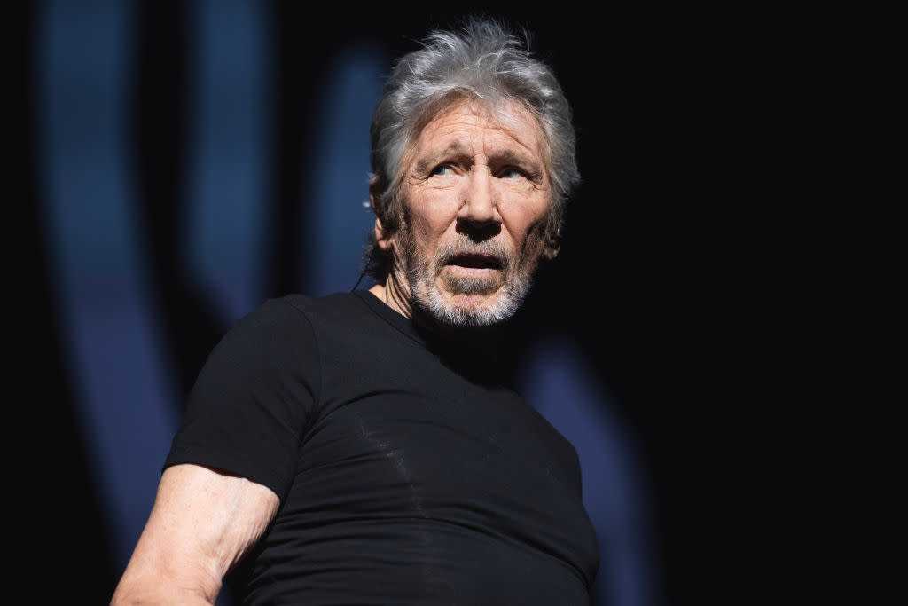  A picture of Roger Waters on stage. 