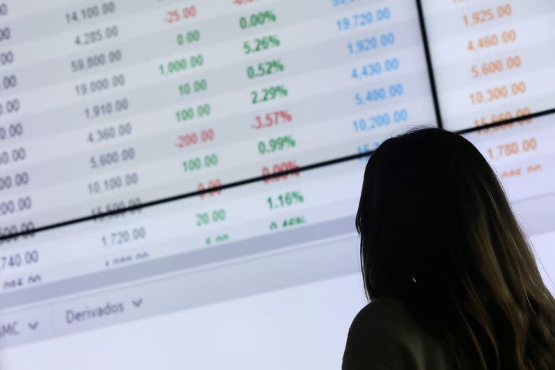 FILE PHOTO: Traders works on the floor of the Colombian Stock Exchange, in Bogota