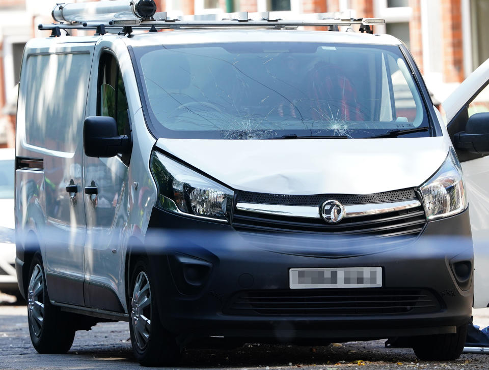 A white van behind a police cordon on the corner of Maples Street and Bentinck Road in Nottingham on Tuesday. (PA)