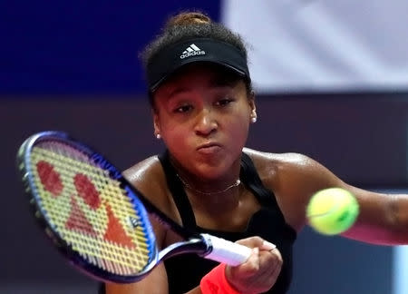 Tennis - Pan Pacific Open Women's Singles Semifinal match - Arena Tachikawa Tachihi, Tokyo, Japan - September 22, 2018. Naomi Osaka of Japan returns a ball to Camila Giorgi of Italy. REUTERS/Toru Hanai