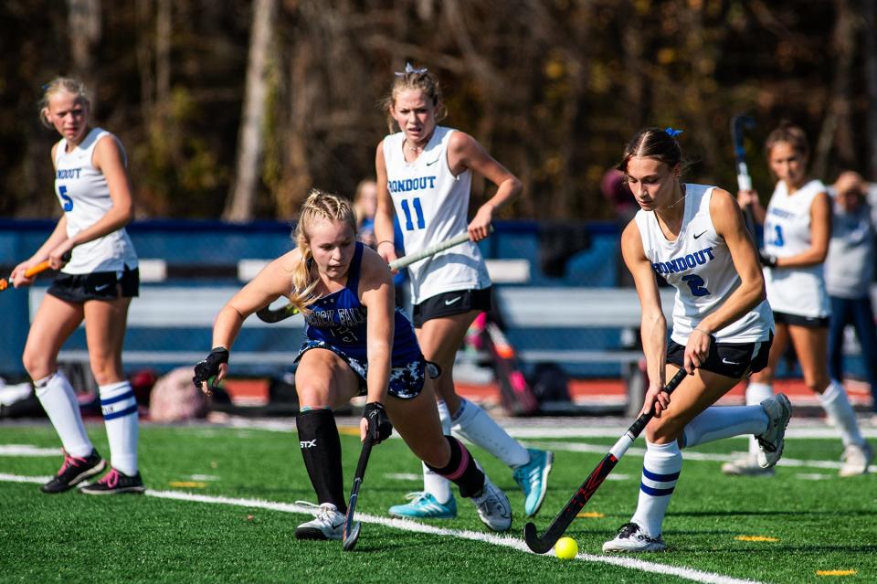 Rondout's Olivia Waruch, right, drives to the goal during the girls Class C regional field hockey game in Accord, NY on Sunday, November 5, 2023. Rondout lost to Hoosick Falls in overtime 2-1. KELLY MARSH/FOR THE TIMES HERALD-RECORD