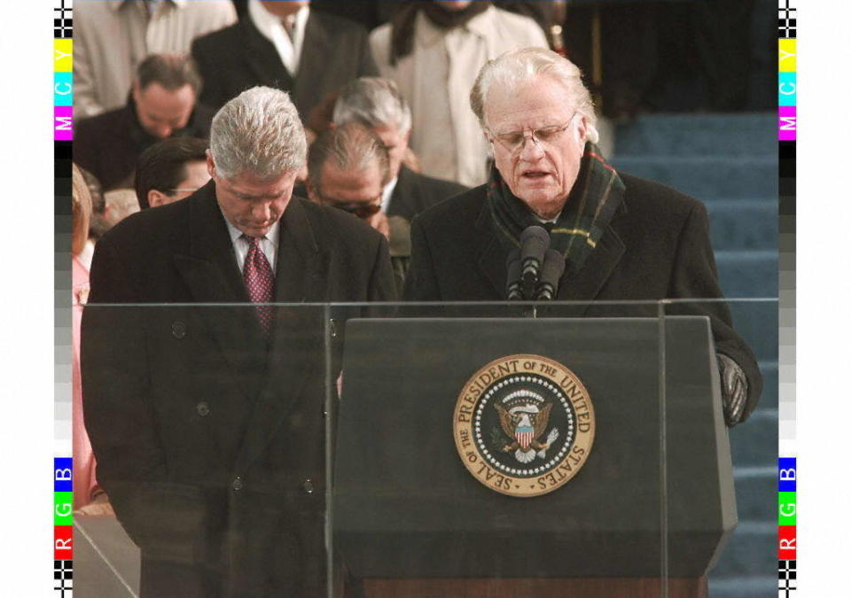 Graham gives the invocation at the beginning of the inauguration ceremony for Bill Clinton's second term as president.