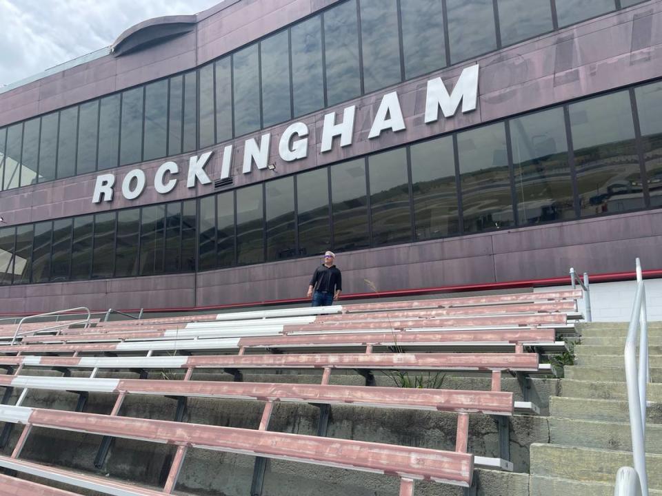 Dan Lovenheim, owner of Rockingham Speedway, stands on the concourse above the grandstands in May 2023. He hopes a NASCAR Cup Series race returns to Richmond County, N.C., soon.