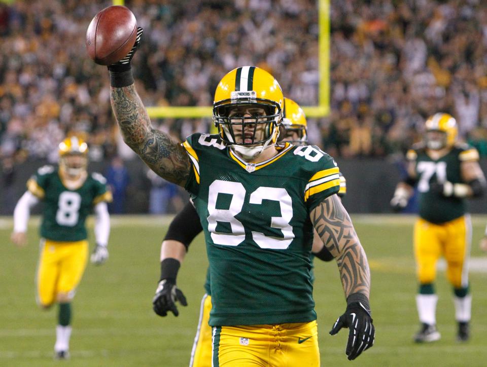 Green Bay Packers tight end Tom Crabtree scores a touchdown on a fake field-goal attempt during the second quarter of their game against the Chicago Bears Thursday, September 13, 2012 at Lambeau Field.