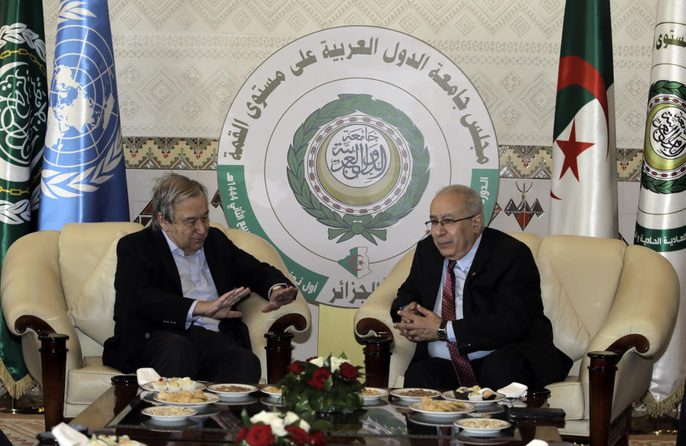 Algerian Foreign Minister Ramtane Lamamra receives United Nations Secretary General António Guterres as he arrives to participate in the Arab Summit as a guest of honor, in Algiers, Algeria, Tuesday, Nov.1, 2022. Algeria is readying to host the 31st summit of the largest annual Arab conference on Tuesday and Wednesday, as the region battles to find common ground over a series of divisive issues. (AP Photo/Toufik Doudou)