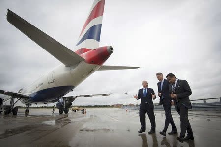 (Left-right) Declan Collier CEO of London City Airport, Chancellor Philip Hammond and Minister for Aviation Lord Ahmad during a visit to London City Airport, Britain July 27, 2016. REUTERS/Stefan Rousseau/Pool