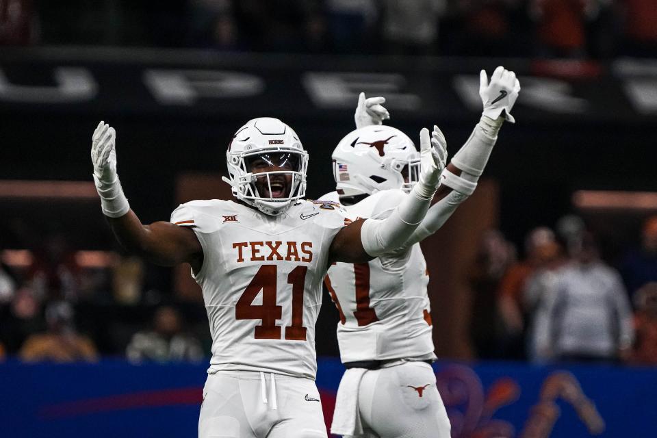 Texas Longhorns linebacker Jaylan Ford (41) celebrates a defensive stop during the Sugar Bowl College Football Playoff semifinals game against the Washington Huskies at the Caesars Superdome on Monday, Jan. 1, 2024 in New Orleans, Louisiana.