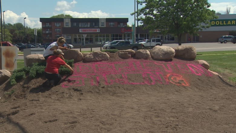 Community members line up to pay respects to fallen Fredericton officers