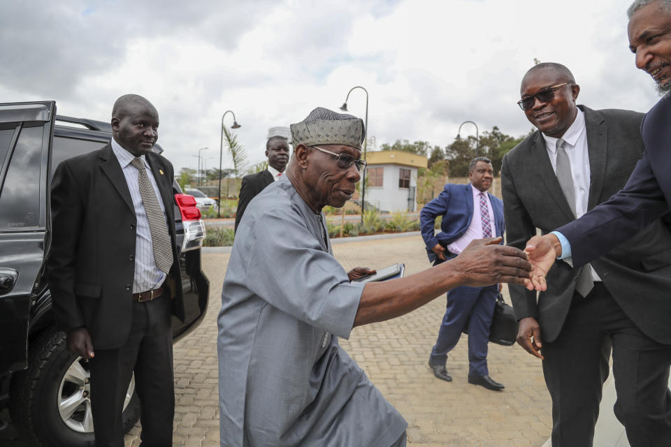 African Union envoy and former Nigerian president Olesegun Obasanjo, center, arrives for Ethiopian peace talks in Nairobi, Kenya Saturday, Nov. 12, 2022. A new round of ongoing talks aims to work out military and other details of last week's signing of a "permanent" cessation of hostilities in a two-year conflict thought to have killed hundreds of thousands of people. (AP Photo/Brian Inganga)