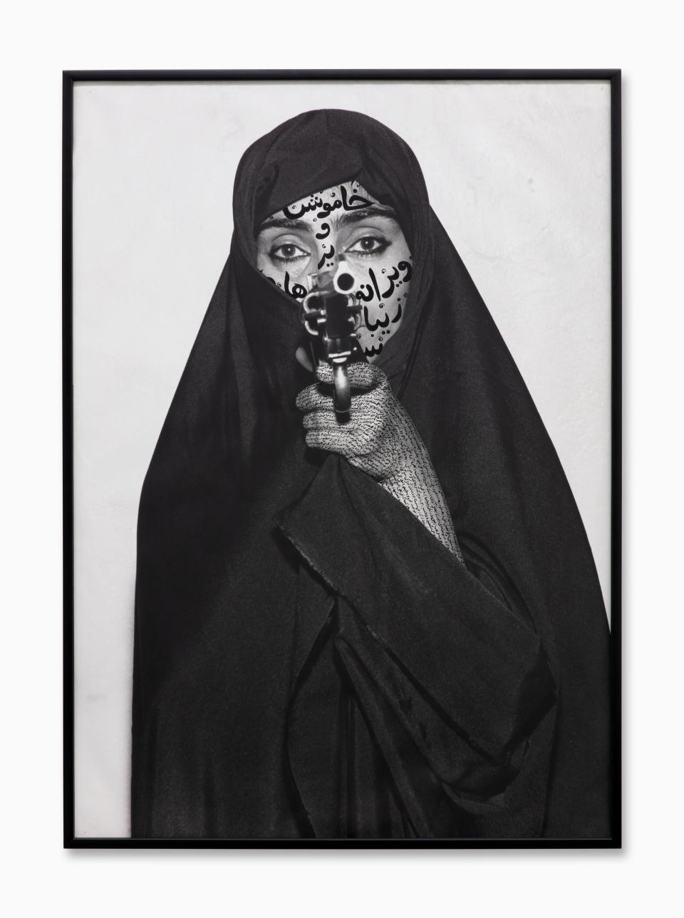 Shirin Neshat "Faceless from Women of Allah Series," 1994 photographic printing, ink; 149 x 107 cm