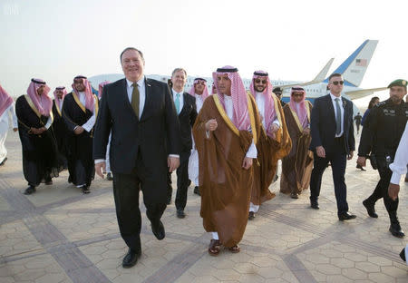 U.S. Secretary of State Mike Pompeo walks with Saudi's Foreign Minister Adel Al-Jubeir upon his arrival in Riyadh, Saudi Arabia April 28, 2018. Saudi Press Agency/Handout via REUTERS