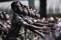 <p>Soldiers of the Regiment du Service Militaire Adapté de Mayotte (RSMA) take part in the annual Bastille Day military parade on the Champs-Élysées avenue in Paris on July 14, 2018. (Photo: Thomas Samson/AFP/Getty Images) </p>