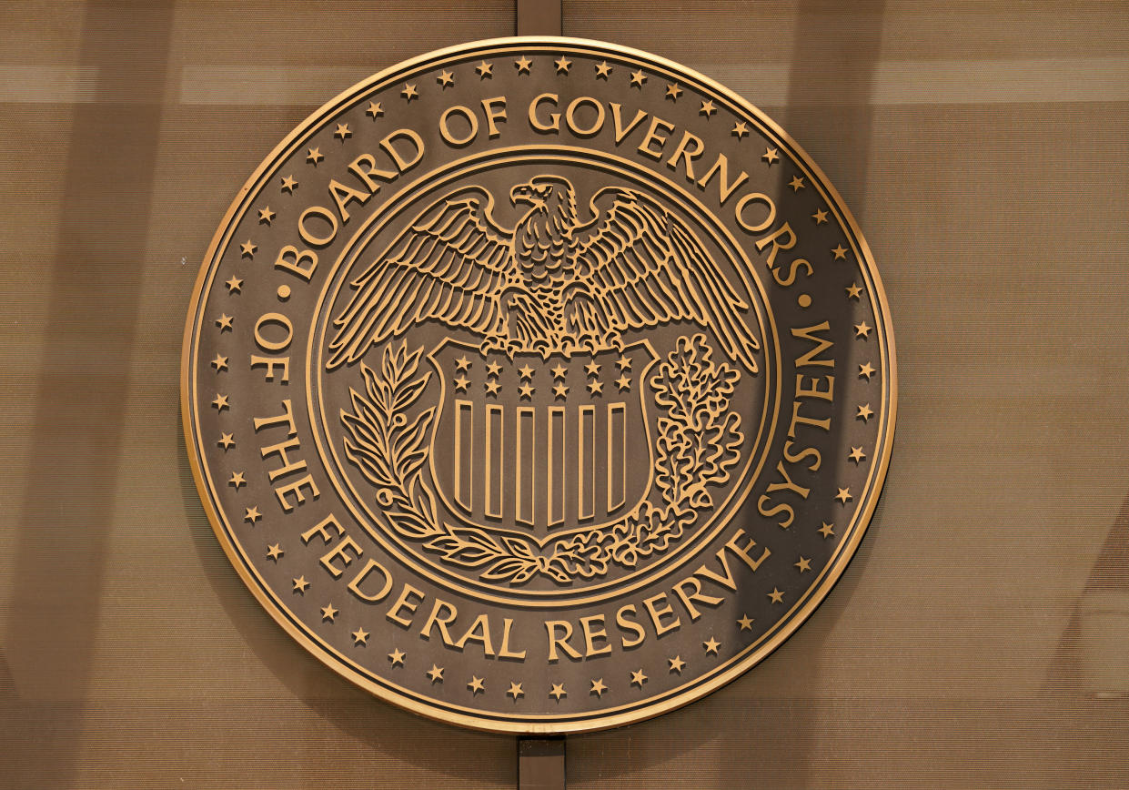 A sign for the Federal Reserve Board of Governors is seen at the entrance to the William McChesney Martin Jr. building ahead of a news conference by Federal Reserve Board Chairman Jerome Powell on interest rate policy, in Washington, U.S., September 21, 2022. REUTERS/Kevin Lamarque