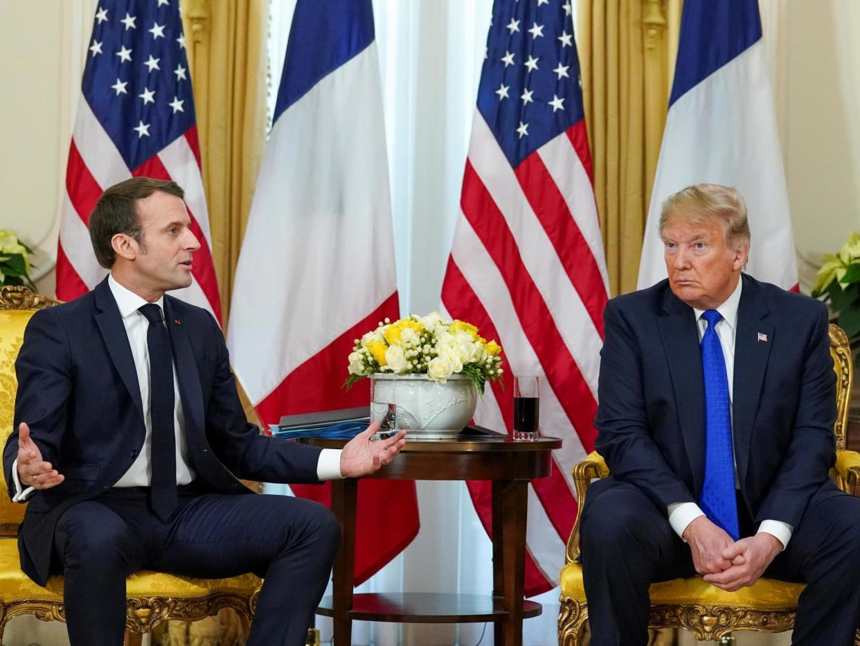Donald Trump looks on as France's president Emmanuel Macron talks during a meeting ahead of the Nato summit in Watford: Kevin Lamarque/Reuters