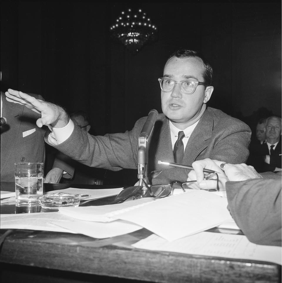FILE - Newton Minow, chairman of the Federal Communications Commission, testifies before the Senate Small Business Subcommittee at a hearing on communication satellites in Washington on Nov. 9, 1961. Minow, who as Federal Communications Commission chief in the early 1960s famously proclaimed that network television was a "vast wasteland," died Saturday, May 6, 2023. He was 97 (AP Photo, File)
