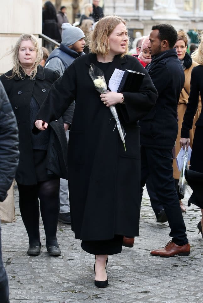 Adele at the Grenfell memorial. (Credit: REX)