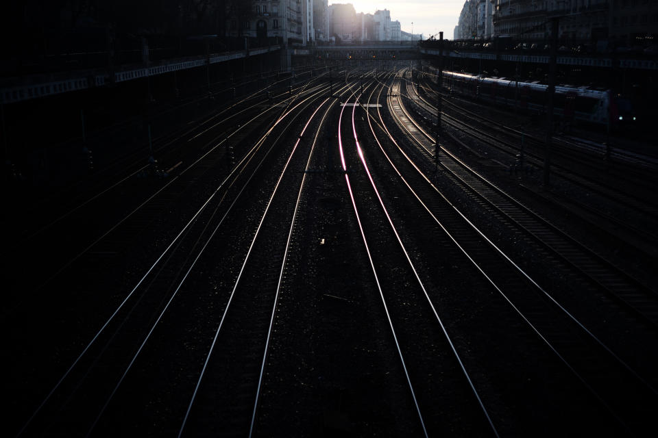Railways are pictured outside the Saint Lazare train station, Tuesday, Dec. 31, 2019 in Paris. The strikes over the French government's plan to revamp the retirement system have disrupted transport across France and beyond, hobbling Paris Metros and trains across the country as well as businesses. The strikes have been especially felt over the holiday season. (AP Photo/Kamil Zihnioglu)