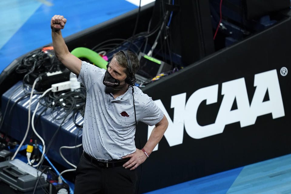 Arkansas head coach Eric Musselman celebrates after a Sweet 16 game against Oral Roberts in the NCAA men's college basketball tournament at Bankers Life Fieldhouse, Saturday, March 27, 2021, in Indianapolis. Arkansas won 72-70. (AP Photo/Darron Cummings)