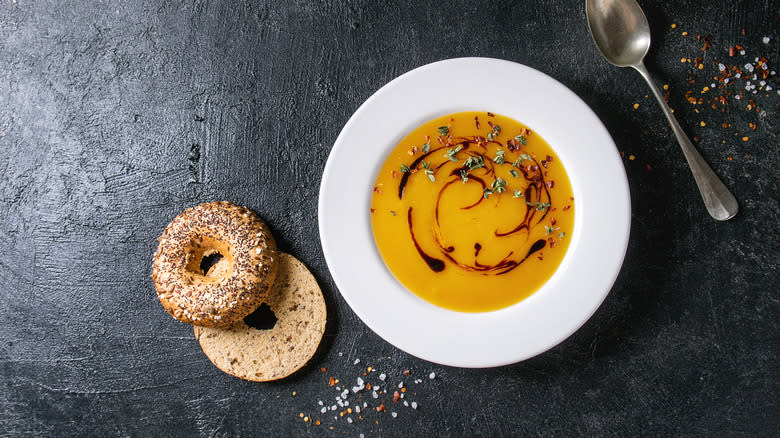 Soup with bagel on the side
