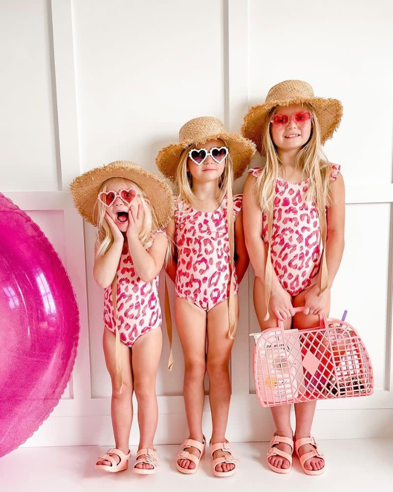 <p><a href="https://www.baileysblossoms.com/collections/mommy-me/products/kai-one-piece-swimsuit-electric-pink-leopard" rel="nofollow noopener" target="_blank" data-ylk="slk:Shop Now;elm:context_link;itc:0;sec:content-canvas" class="link ">Shop Now</a></p><p>Bailey's Blossoms</p><p>baileysblossoms.com</p><span class="copyright">Bailey's Blossoms</span>