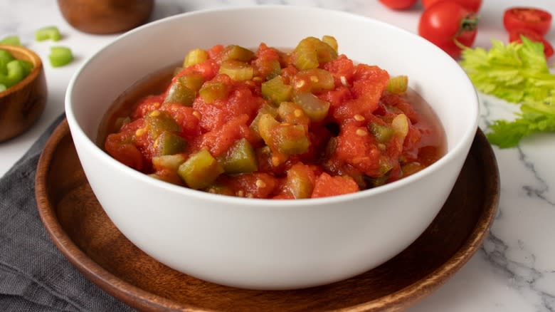 Stewed tomatoes in white bowl