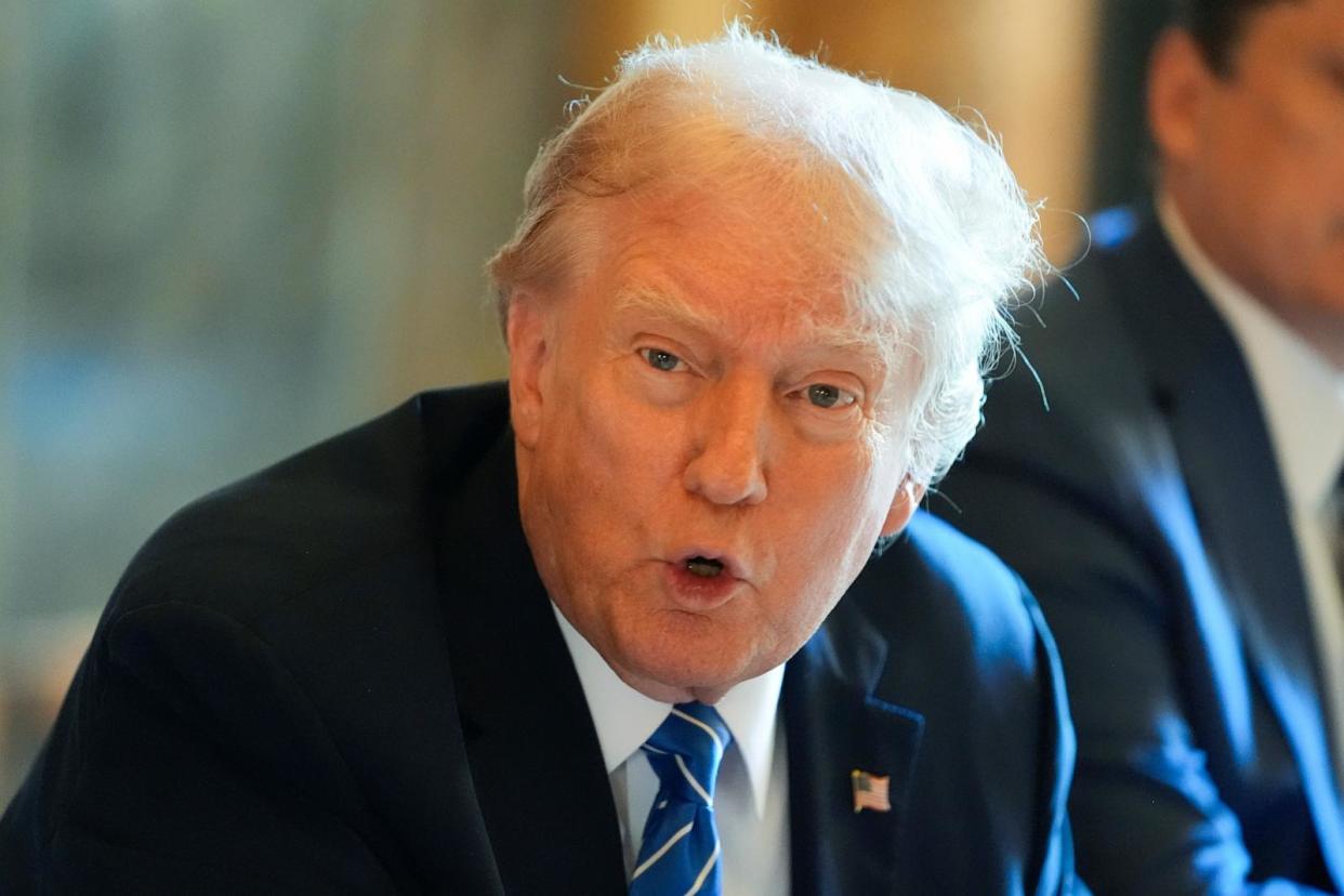 PHOTO: Republican presidential candidate former President Donald Trump speaks while meeting with Israeli Prime Minister Benjamin Netanyahu at his Mar-a-Lago estate, July 26, 2024, in Palm Beach, Fla.  (Alex Brandon/AP)