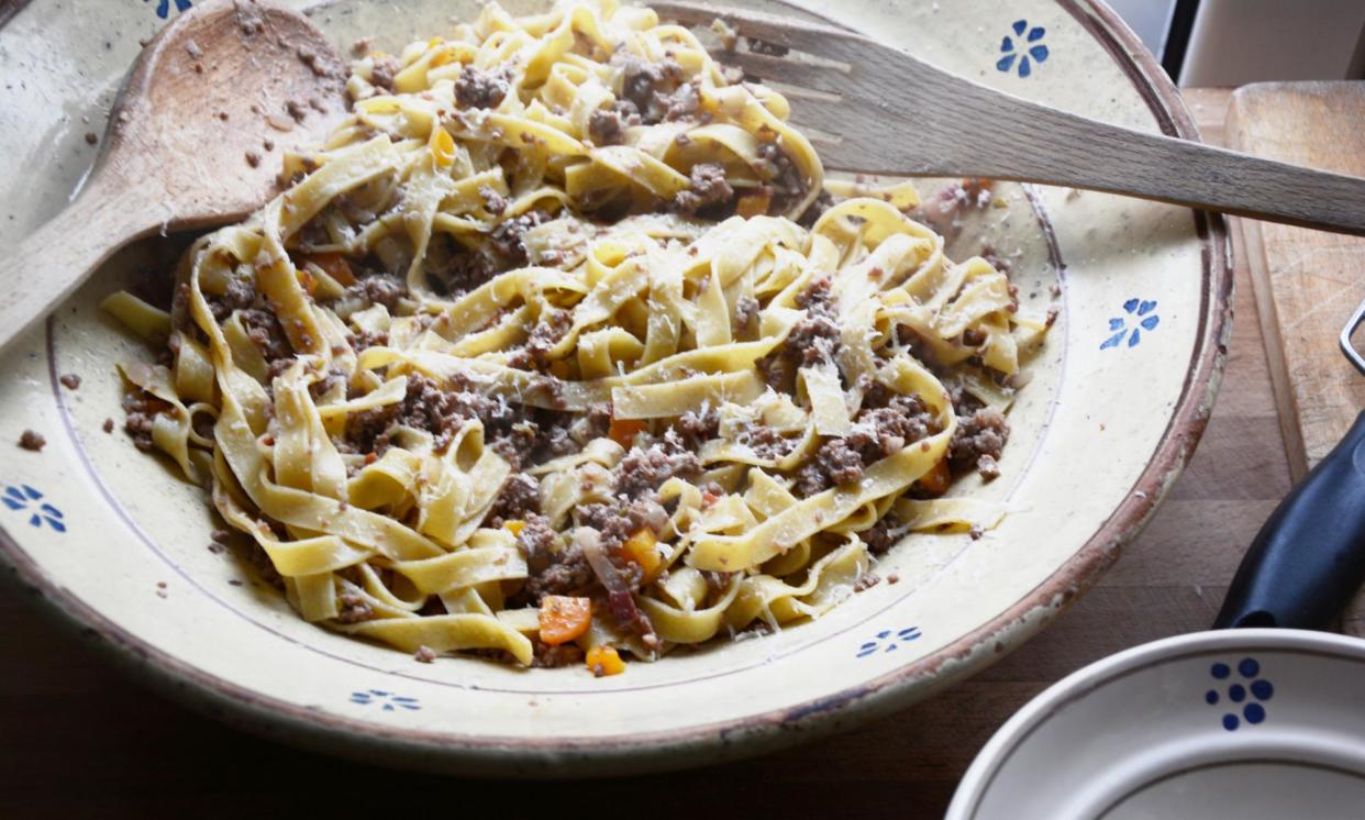 <span>Milk sounds like an odd addition to a ragu, but it’s gorgeous, softening the edges and making the whole thing rounded and very delicious</span><span>Photograph: Rachel Roddy/The Guardian</span>