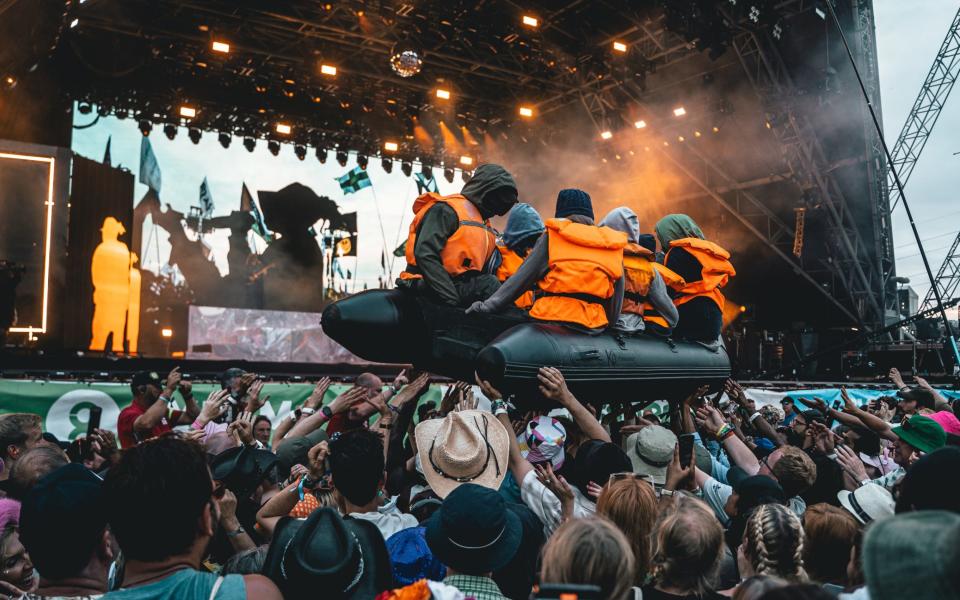 Members of the audience were holding up the boat