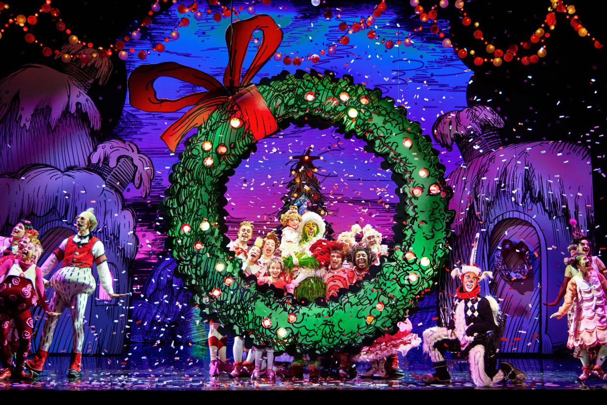 James Schultz, as the Grinch, Aerina DeBoer, as Cindy Lou Who, and the touring company of "Dr. Seuss' How the Grinch Stole Christmas! The Musical."