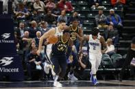 Nov 27, 2017; Indianapolis, IN, USA; Indiana Pacers guard Victor Oladipo (4) leads a fast break against the Orlando Magic during the third quarter at Bankers Life Fieldhouse. Mandatory Credit: Brian Spurlock-USA TODAY Sports