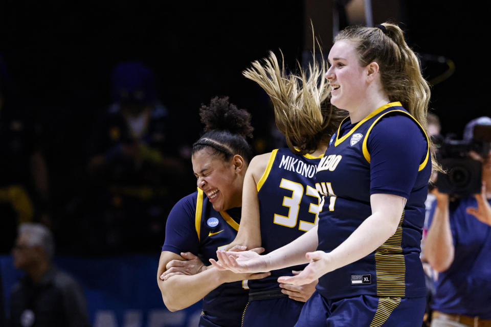 Toledo forward Jessica Cook (34), guard Sammi Mikonowicz (33), and guard Justina King (1) celebrate after a first-round college basketball game against Iowa State in the NCAA Tournament, Saturday, March 18, 2023, in Knoxville, Tenn. (AP Photo/Wade Payne)