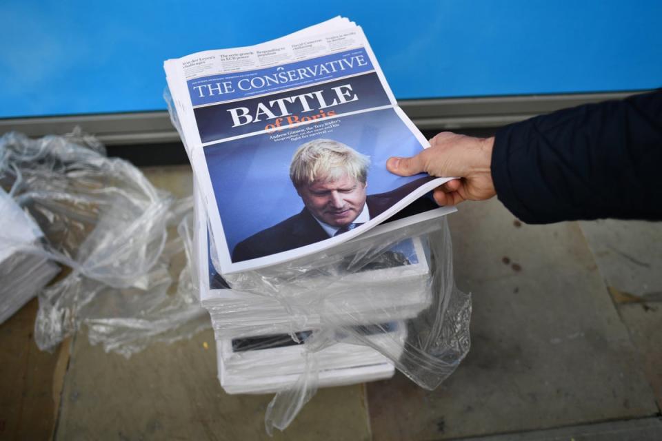 Copies of The Conservative newspaper are ready to be distributed during the Conservative Party conference on 30 September (Getty)