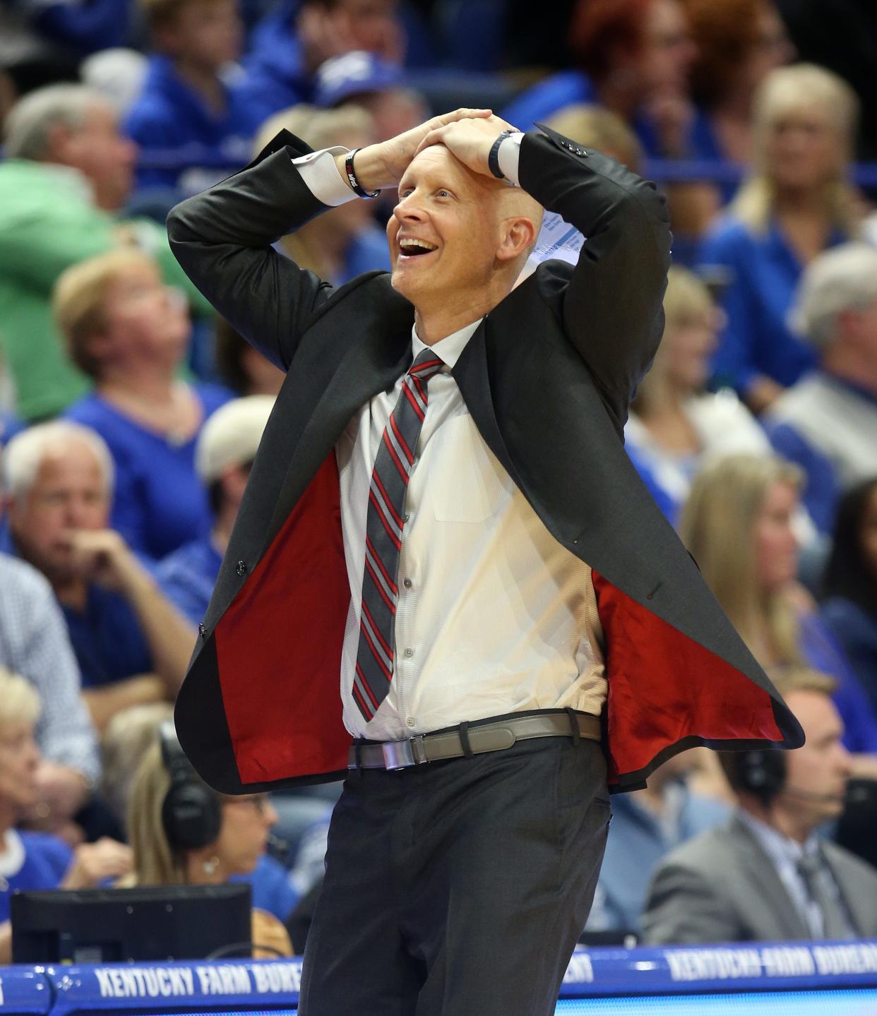 Louisville coach Chris Mack reacts to a call in the second half against Kentucky.December 28, 2019
